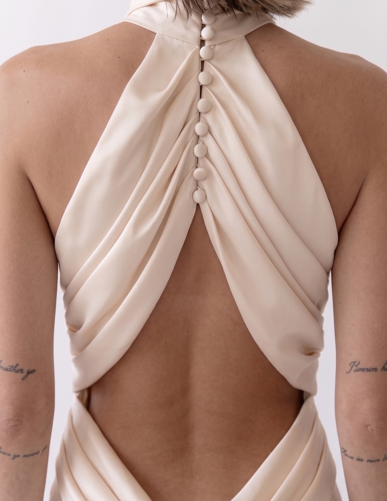 Ablaze Ivory Draped Backless Halter Gown