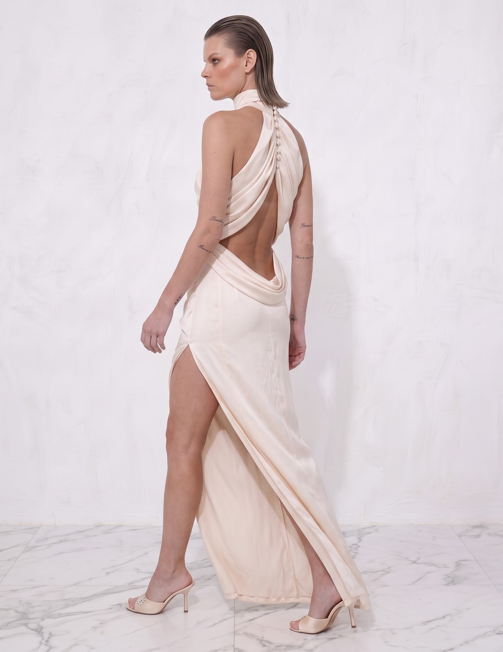 Ablaze Ivory Draped Backless Halter Gown