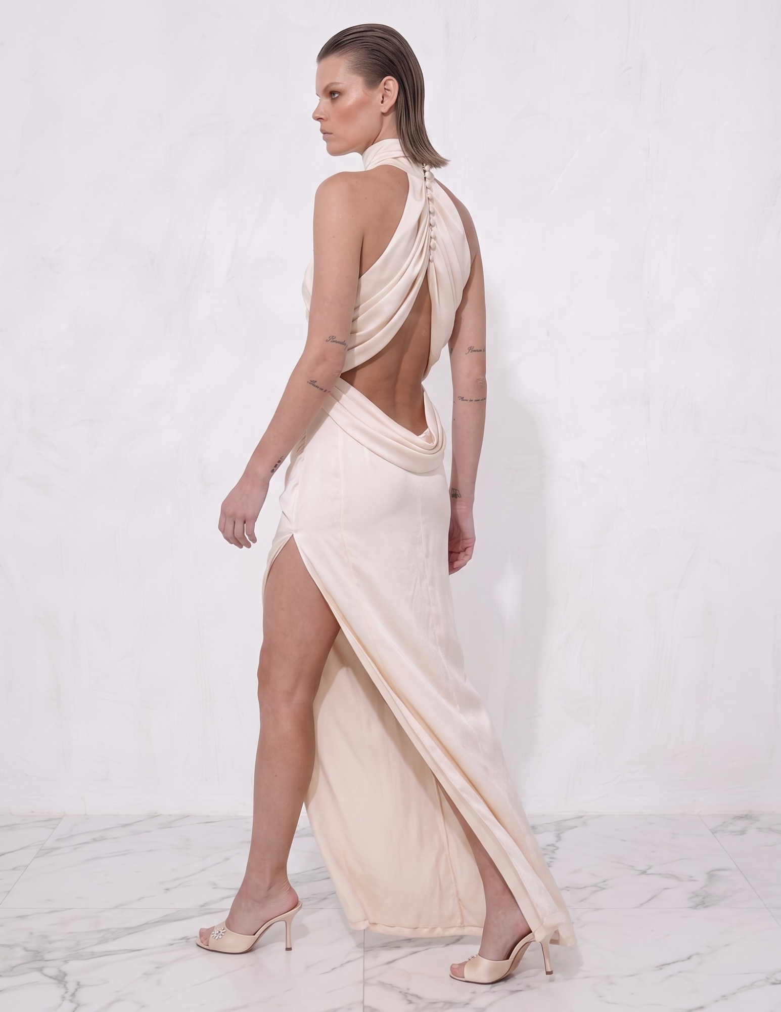 Ablaze Ivory Draped Backless Halter Gown