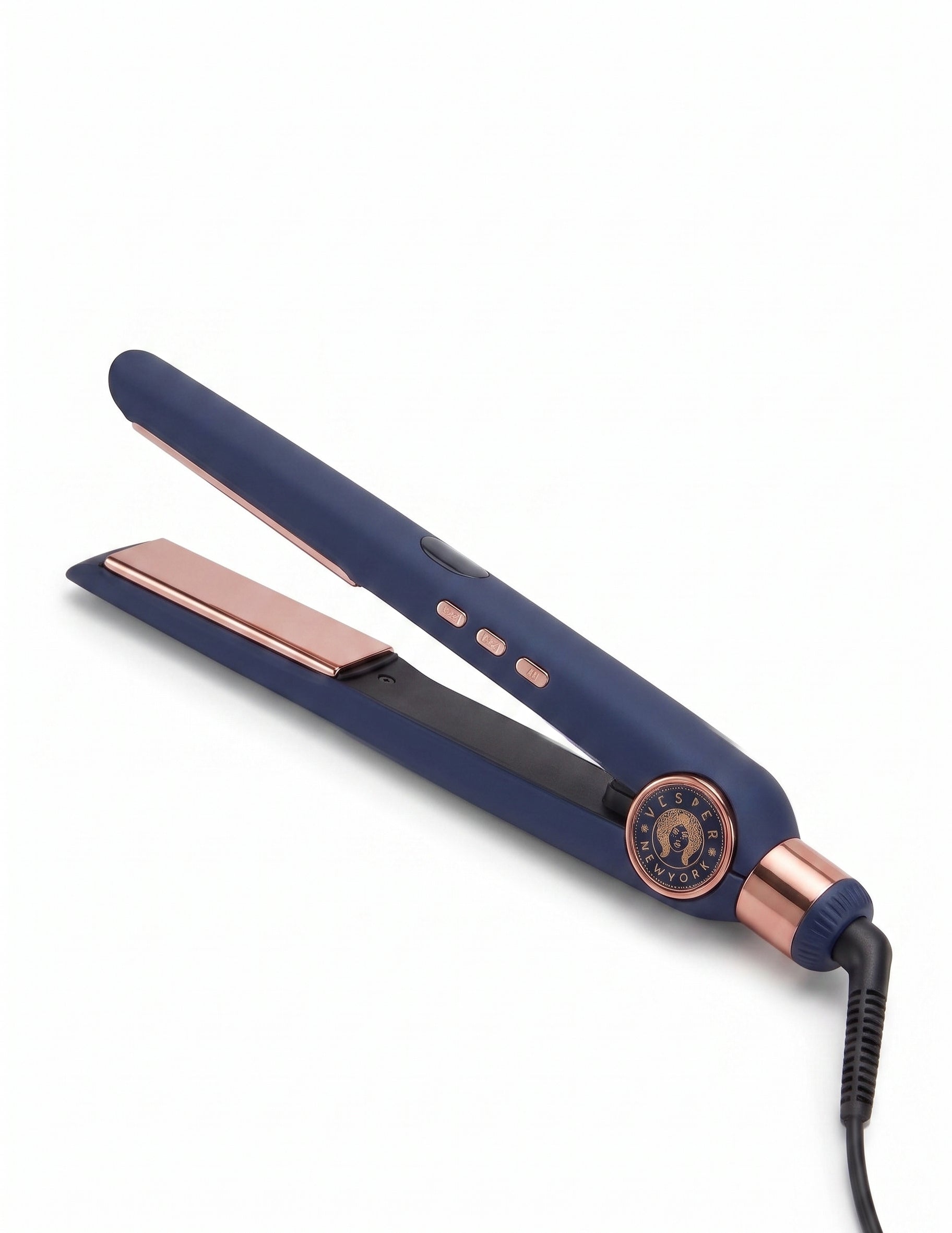 A navy blue flat iron hair straightener with rose gold accents, including the plates, trim button, and power cord base, shown on a clean white background.